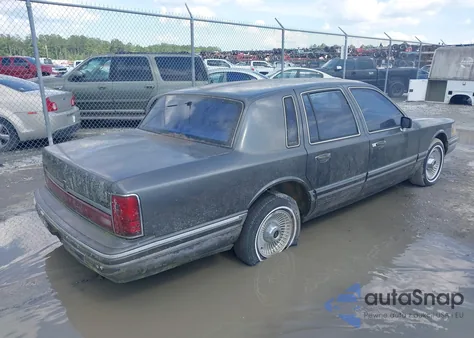 1991 Lincoln Town Car Executive z USA, uszkodzony, nr VIN 1LNCM81W9MY732357